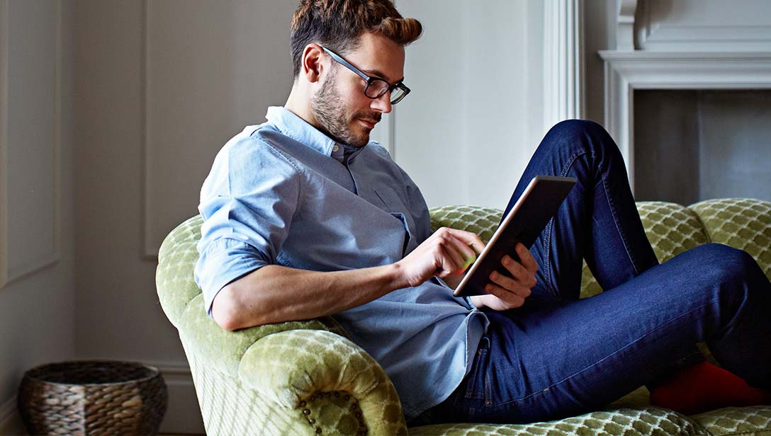 Man reading tablet